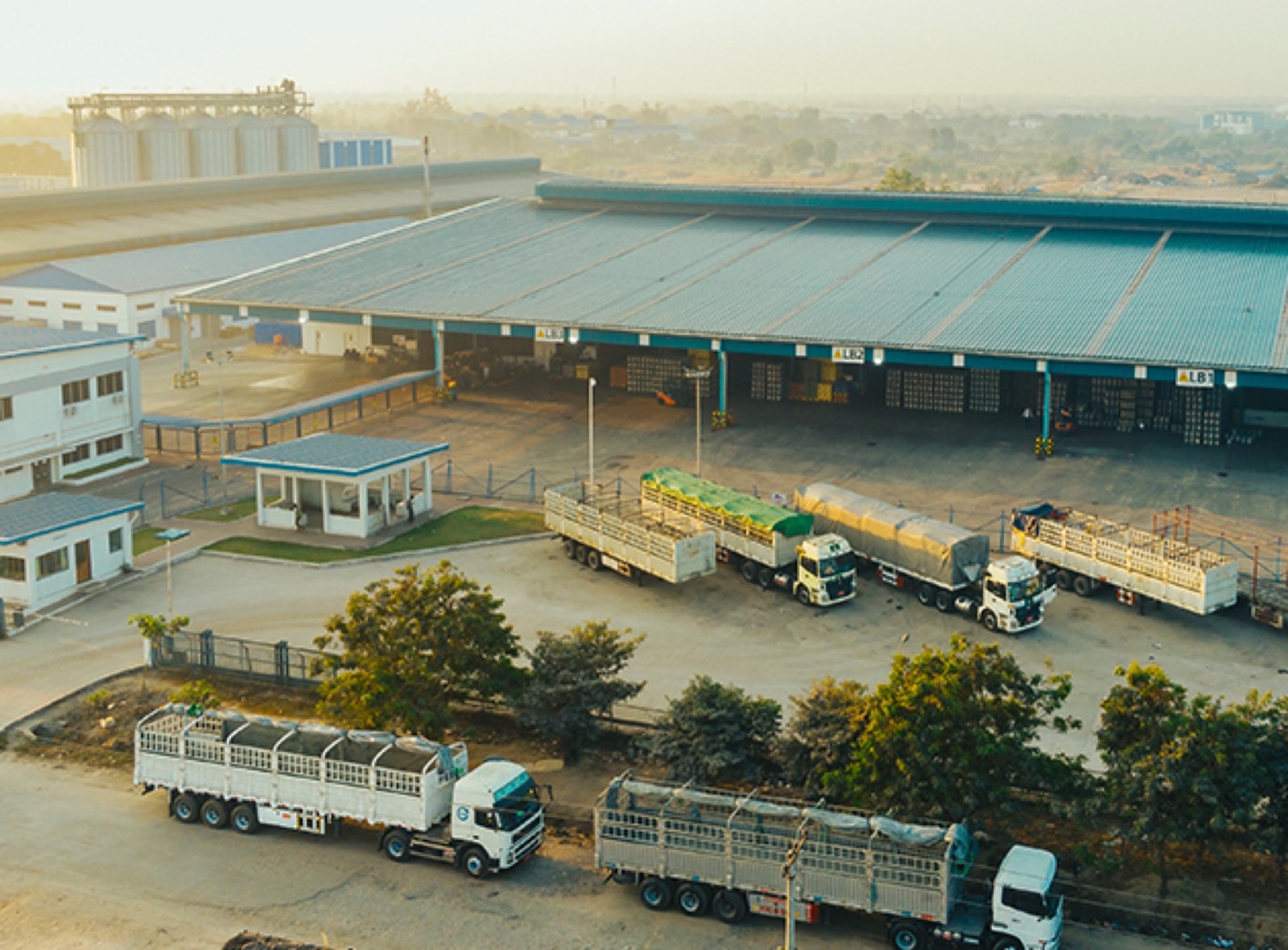 Fertilizer stock yard with trucks being loaded